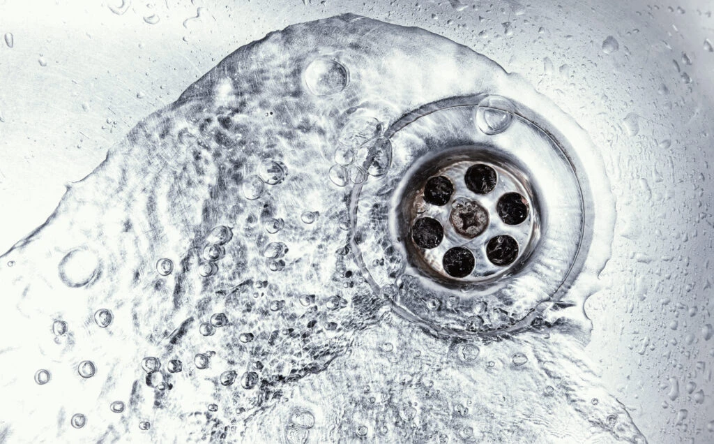 un clogged shower drain